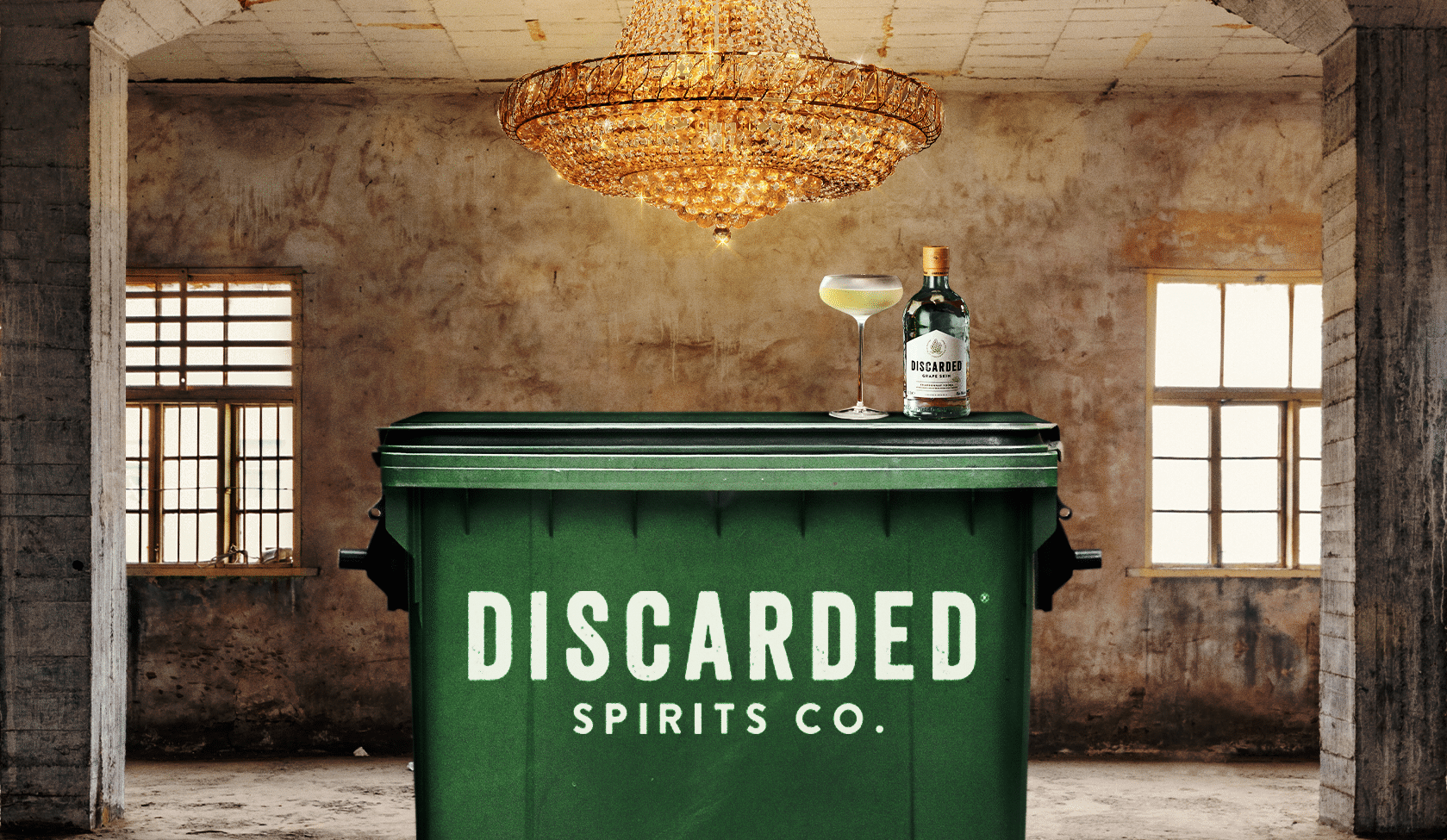 A bar made out of a green bin with the Discarded Spirits Co, part of London Cocktail Week 2021