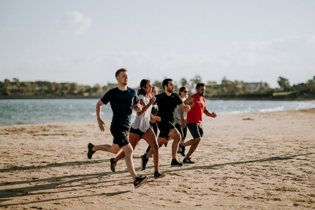 A group of runners on the beach