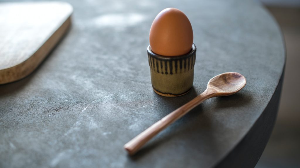 An egg cup, often thought to be the inspiration behind why cocktails are called cocktails
