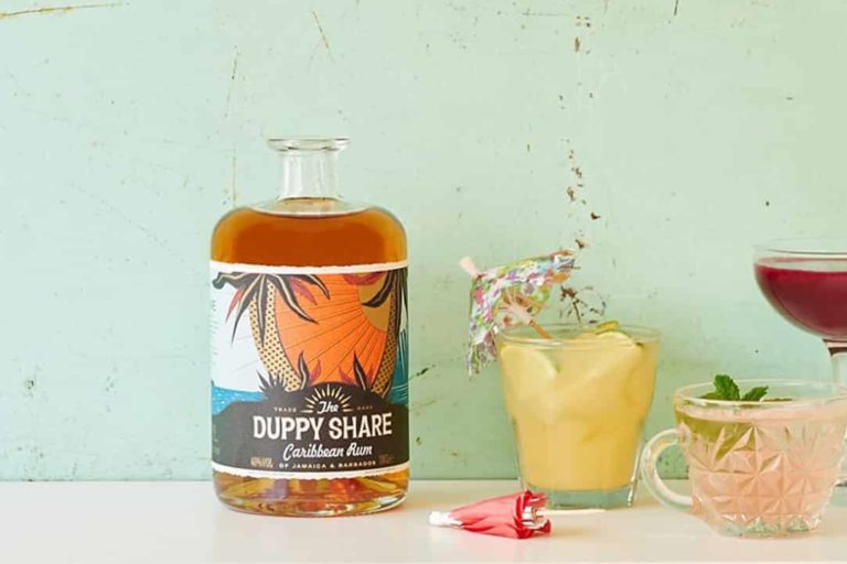 The Duppy Share Aged Rum next to a Fruity Mai Tai recipe